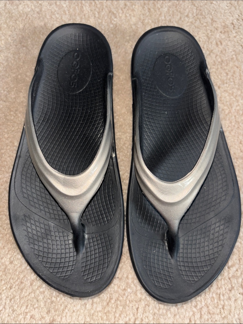 OOFOS Black Flip Flops with Latte color strap